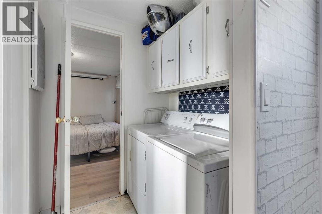 101 Huntstrom Drive Ne, Calgary, AB - Indoor Photo Showing Laundry Room