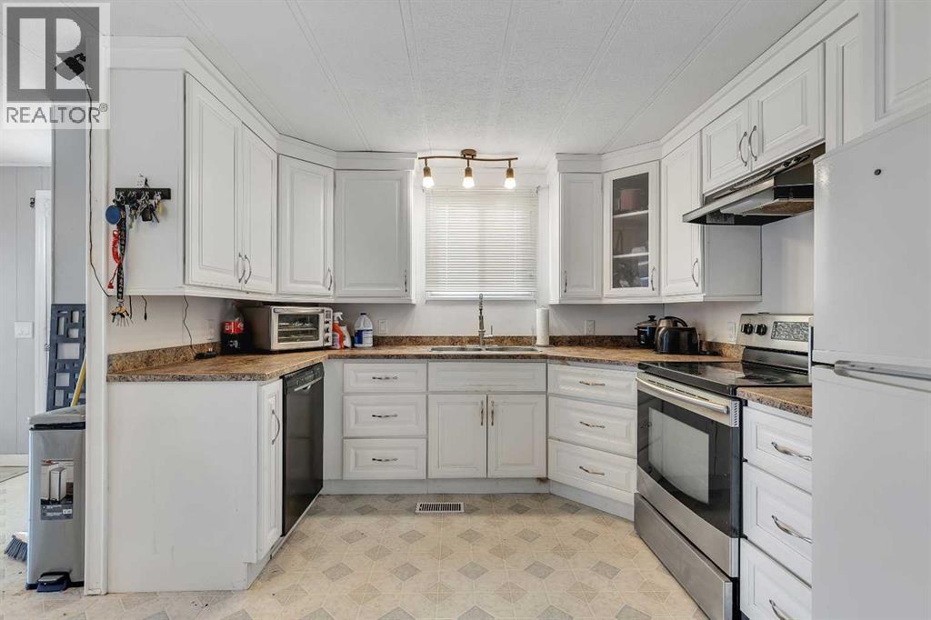 101 Huntstrom Drive Ne, Calgary, AB - Indoor Photo Showing Kitchen