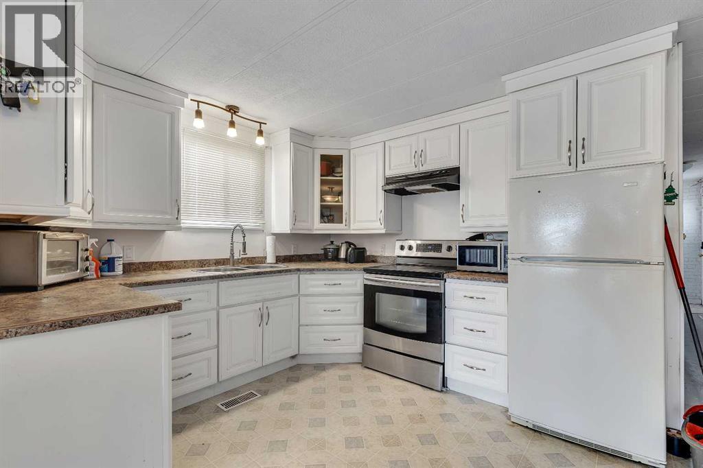 101 Huntstrom Drive Ne, Calgary, AB - Indoor Photo Showing Kitchen