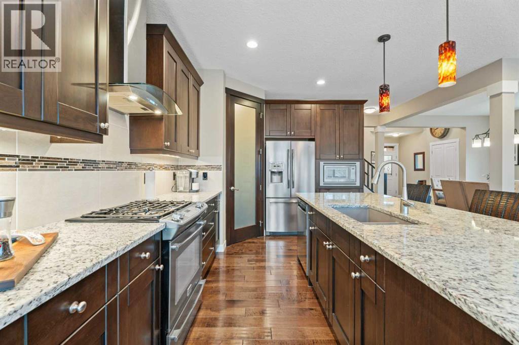 Tons of cabinetry & counter space - 199 Cranarch Landing Se, Calgary, AB - Indoor Photo Showing Kitchen With Upgraded Kitchen