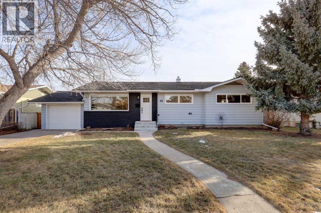 Beautifully renovated bungalow on a 70 foot wide lot with singke attached garage and double rear garage - 36 Glenview Drive Sw, Calgary, AB - Outdoor With Facade