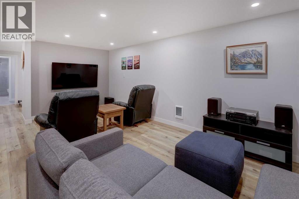 Rec room/TV area in the basement - 36 Glenview Drive Sw, Calgary, AB - Indoor