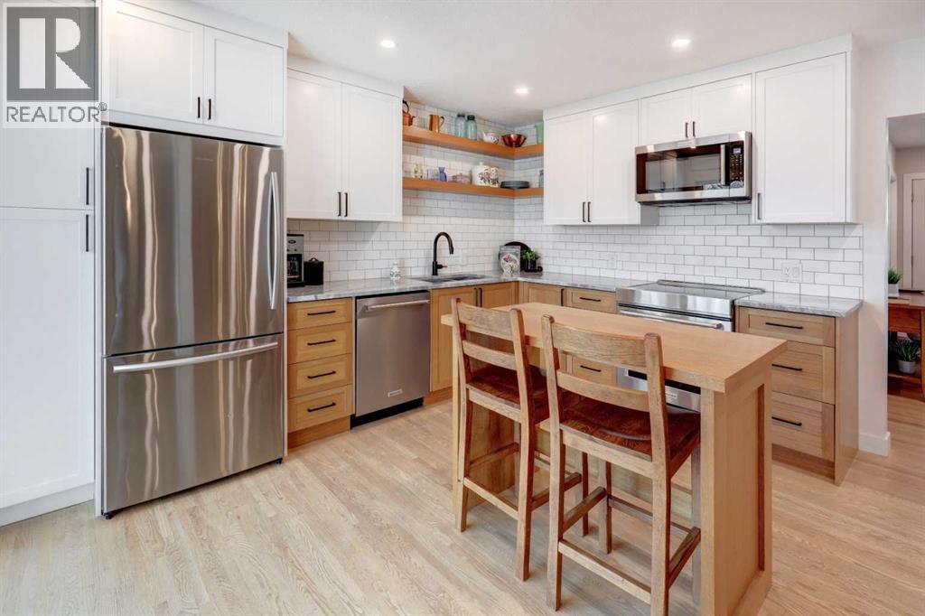 36 Glenview Drive Sw, Calgary, AB - Indoor Photo Showing Kitchen With Stainless Steel Kitchen With Upgraded Kitchen