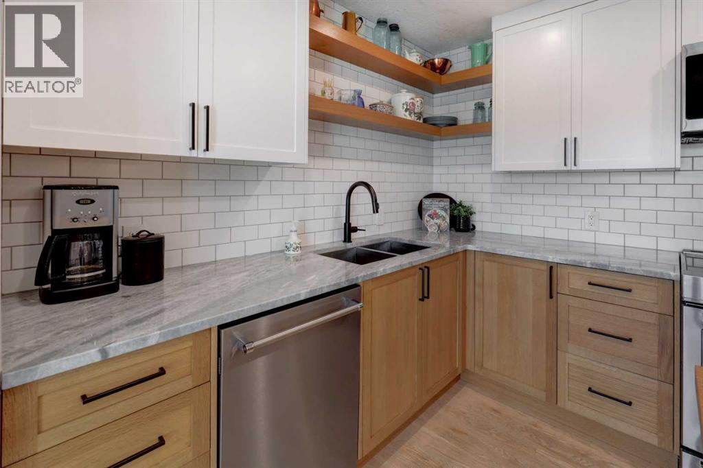 36 Glenview Drive Sw, Calgary, AB - Indoor Photo Showing Kitchen With Double Sink With Upgraded Kitchen