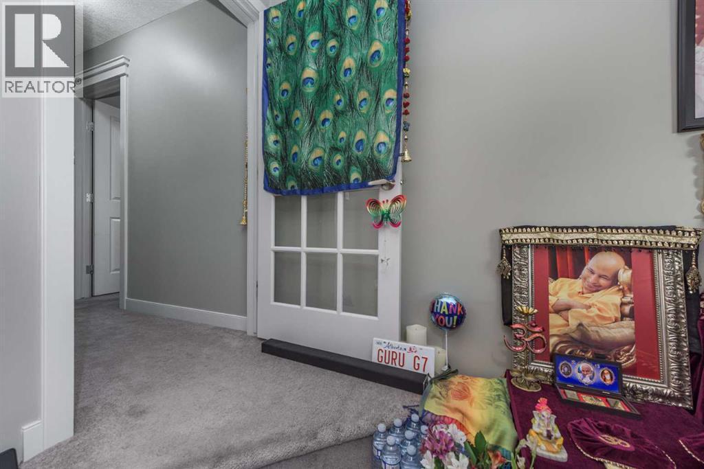 76 Evanspark Circle Nw, Calgary, AB - Indoor Photo Showing Other Room