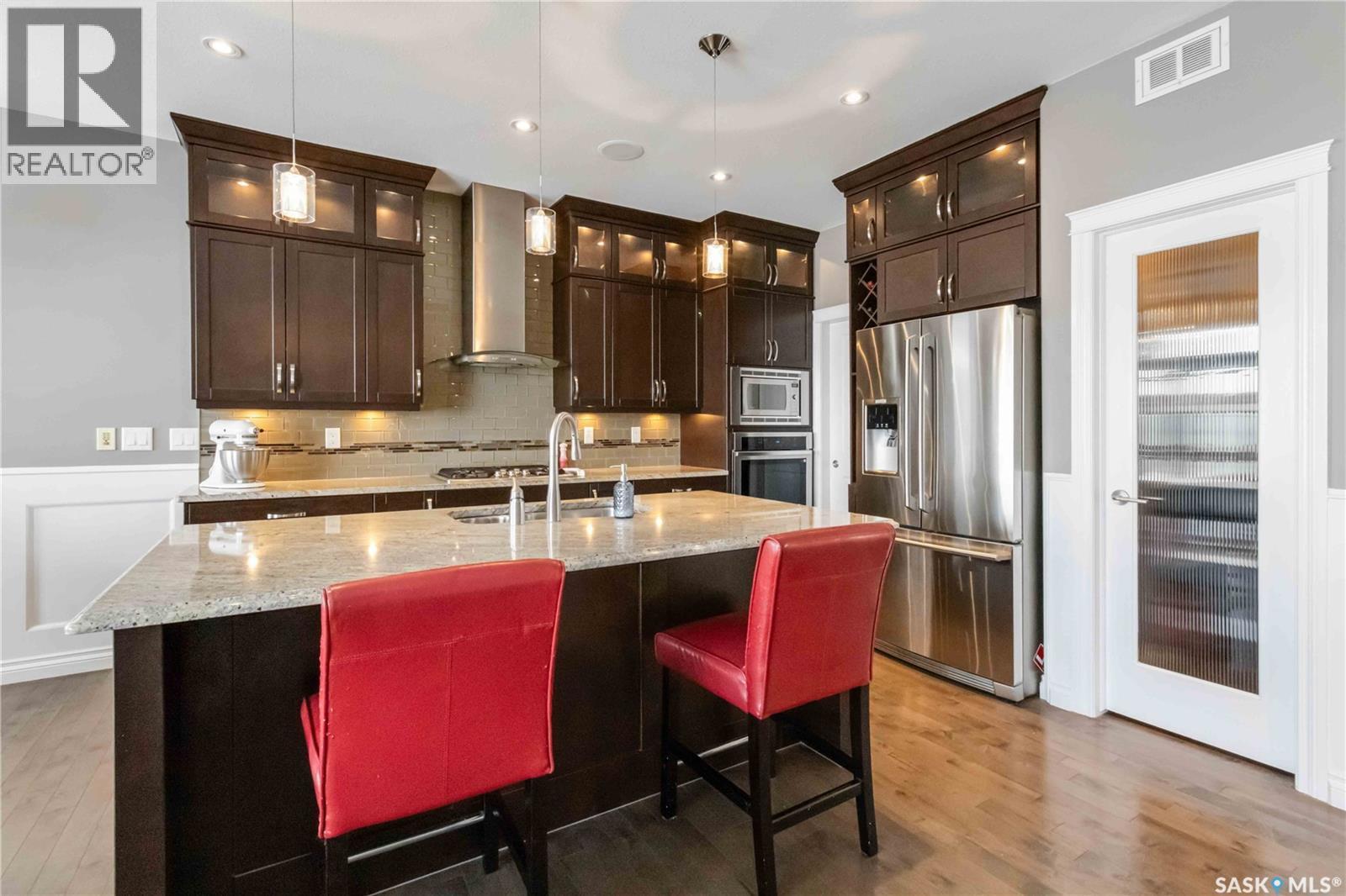 119 Masuda Terrace, Saskatoon, SK - Indoor Photo Showing Kitchen With Double Sink With Upgraded Kitchen