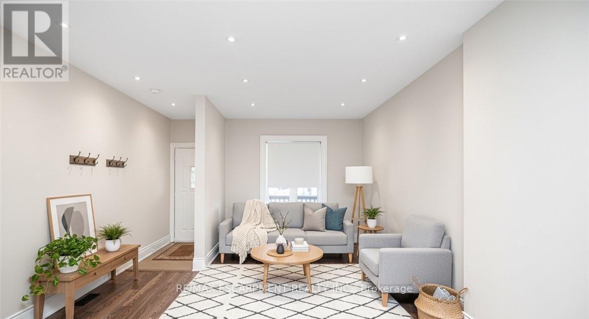 VIRTUALLY STAGED - 319 Hunter Street W, Hamilton, ON - Indoor Photo Showing Living Room