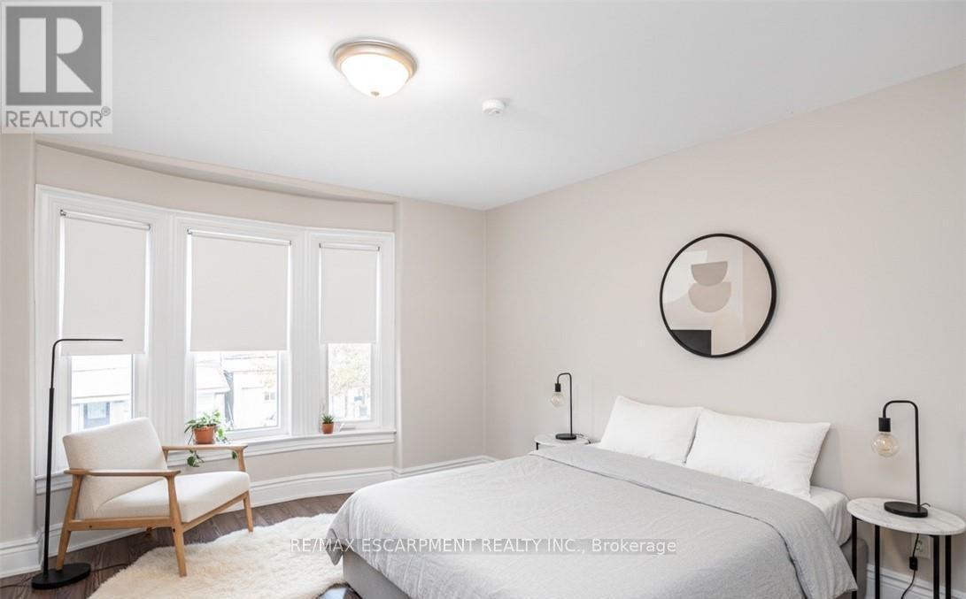 VIRTUALLY STAGED - 319 Hunter Street W, Hamilton, ON - Indoor Photo Showing Bedroom