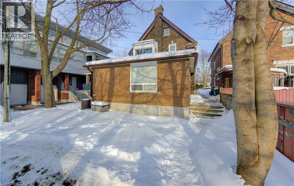 Backyard/Parking - 61 Waterloo Street, Kitchener, ON - Outdoor With Facade