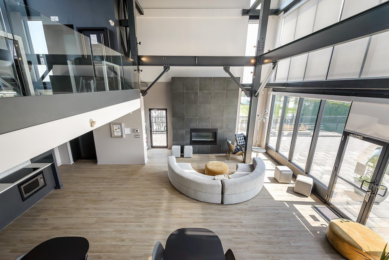 Common room - 349-3700 Rue St-Antoine O., Montréal (Le Sud-Ouest), QC - Indoor With Fireplace