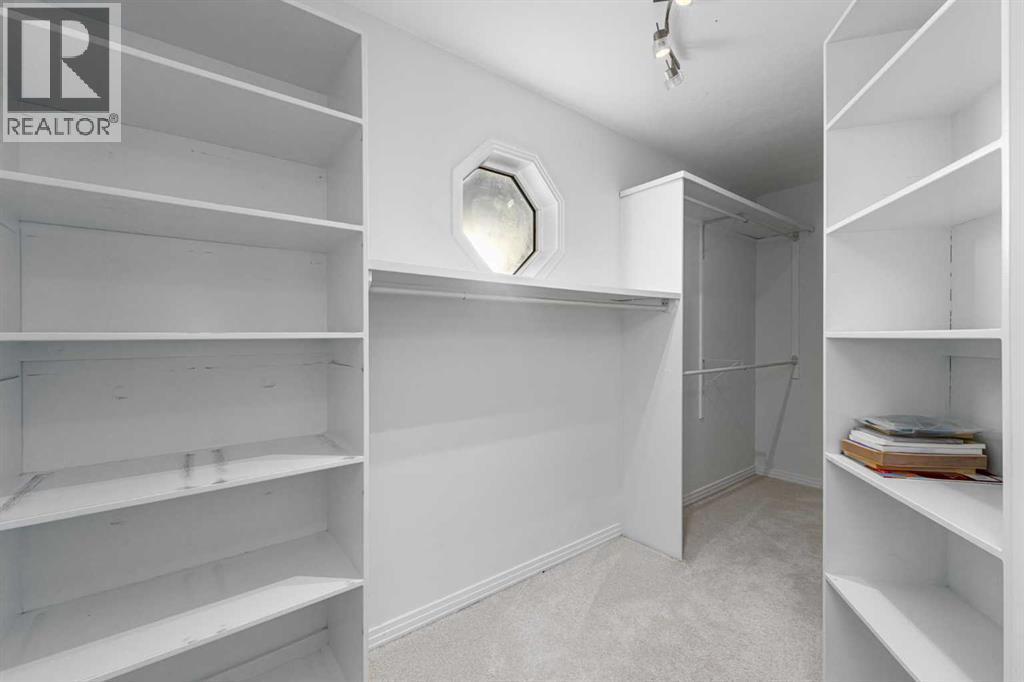 5503 Strathcona Hill Sw, Calgary, AB - Indoor With Storage