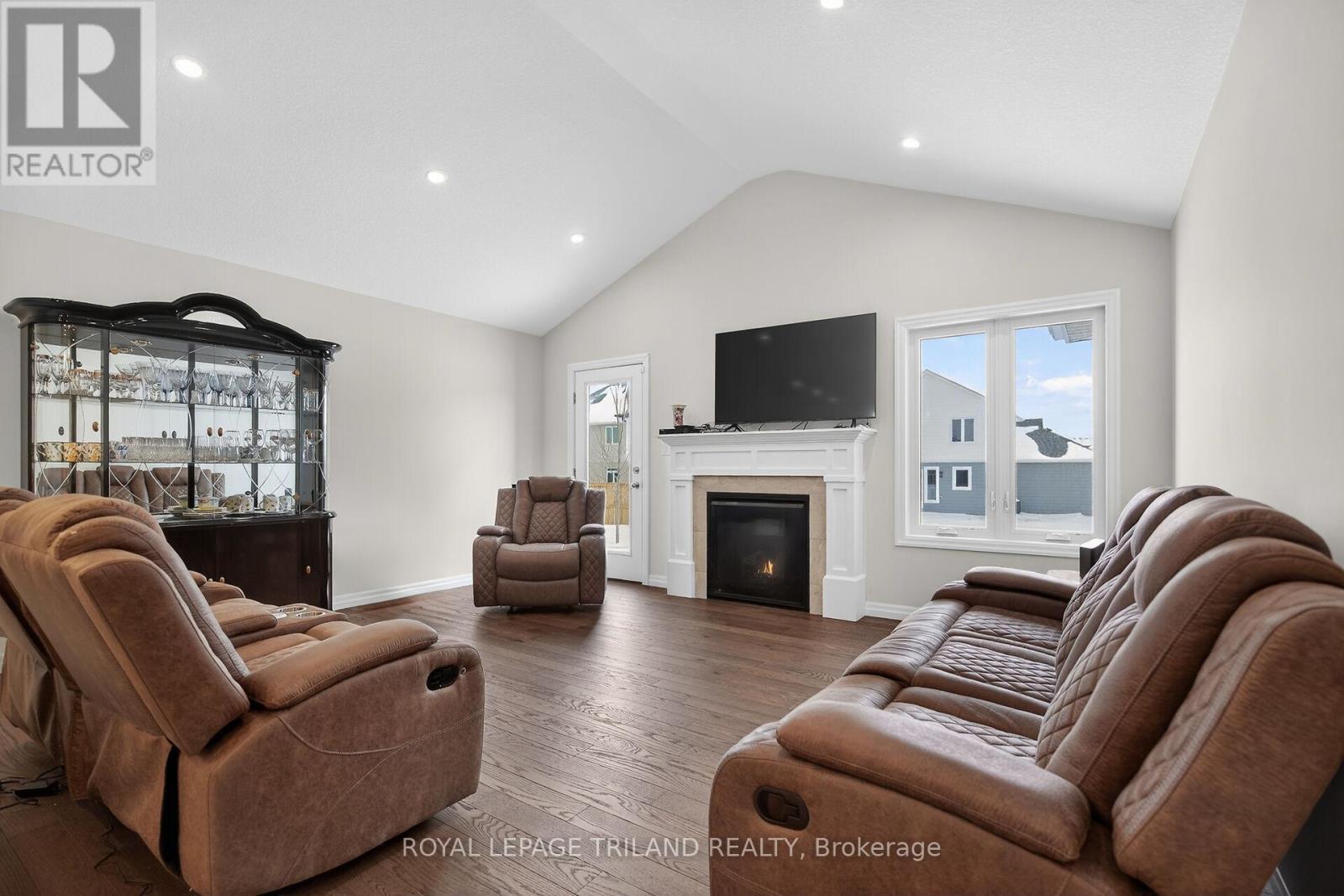 64 Ambrosia Path, St. Thomas, ON - Indoor Photo Showing Living Room With Fireplace