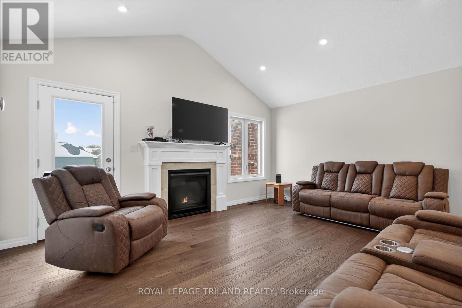 64 Ambrosia Path, St. Thomas, ON - Indoor Photo Showing Living Room With Fireplace