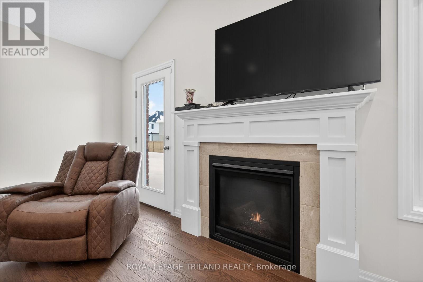 64 Ambrosia Path, St. Thomas, ON - Indoor Photo Showing Living Room With Fireplace