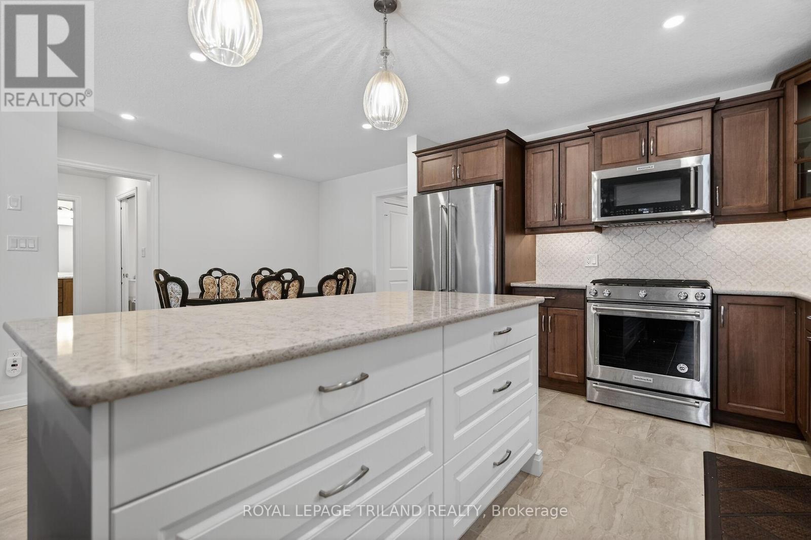 64 Ambrosia Path, St. Thomas, ON - Indoor Photo Showing Kitchen With Stainless Steel Kitchen With Upgraded Kitchen