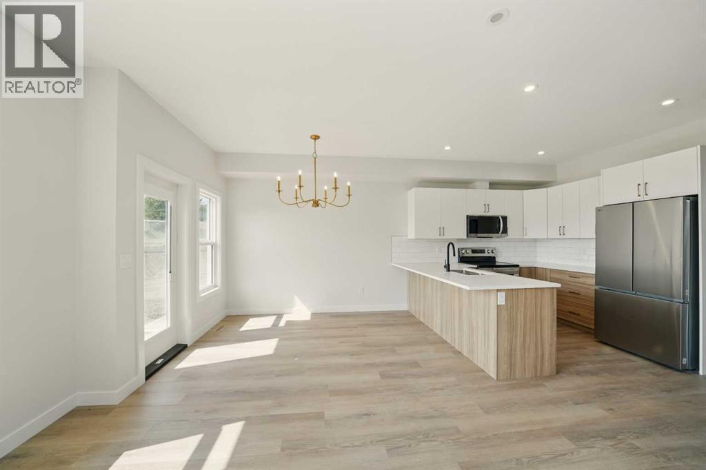 57 Pinnacle Close, Blackfalds, AB - Indoor Photo Showing Kitchen