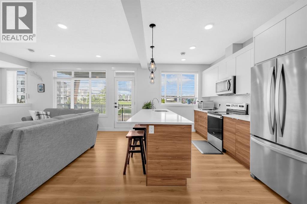 4397 Seton Drive Se, Calgary, AB - Indoor Photo Showing Kitchen With Upgraded Kitchen