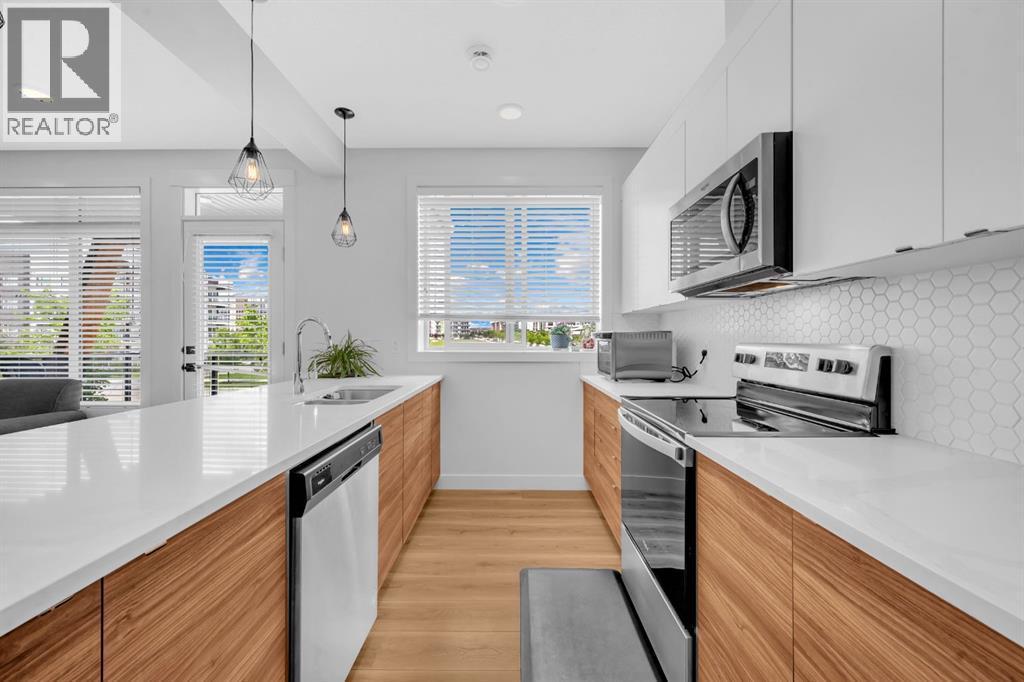 4397 Seton Drive Se, Calgary, AB - Indoor Photo Showing Kitchen With Upgraded Kitchen