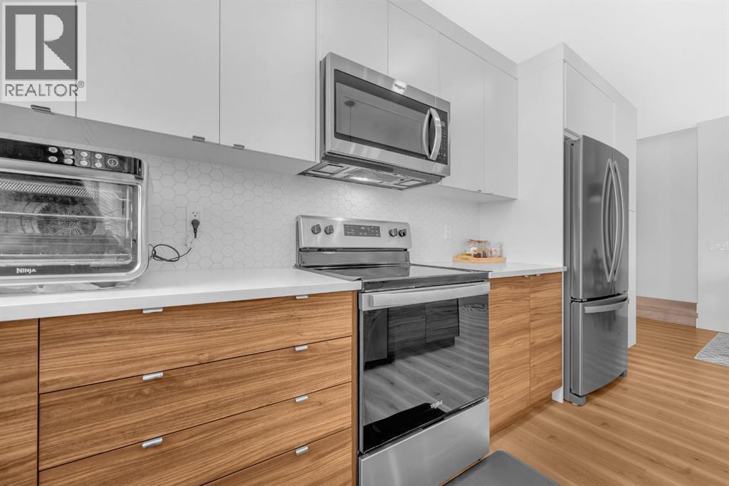 4397 Seton Drive Se, Calgary, AB - Indoor Photo Showing Kitchen With Upgraded Kitchen