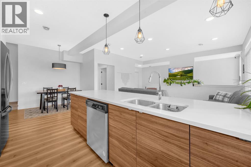 4397 Seton Drive Se, Calgary, AB - Indoor Photo Showing Kitchen With Double Sink