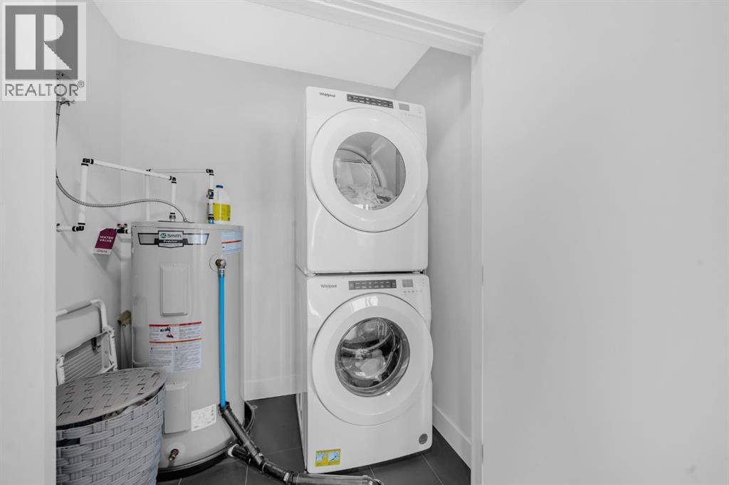 4397 Seton Drive Se, Calgary, AB - Indoor Photo Showing Laundry Room