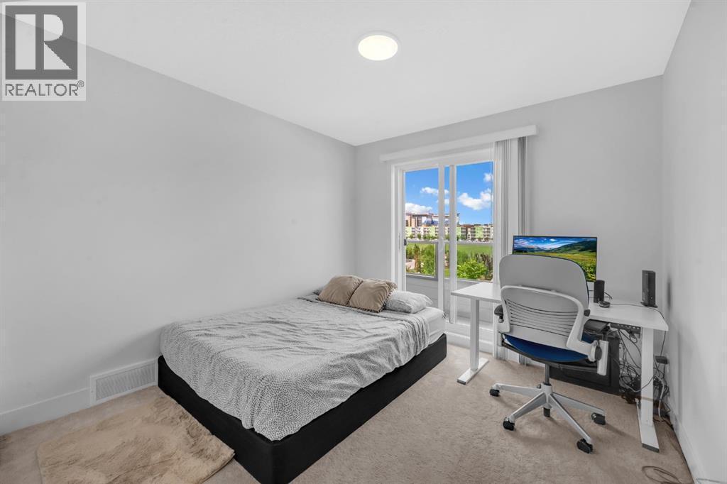 4397 Seton Drive Se, Calgary, AB - Indoor Photo Showing Bedroom
