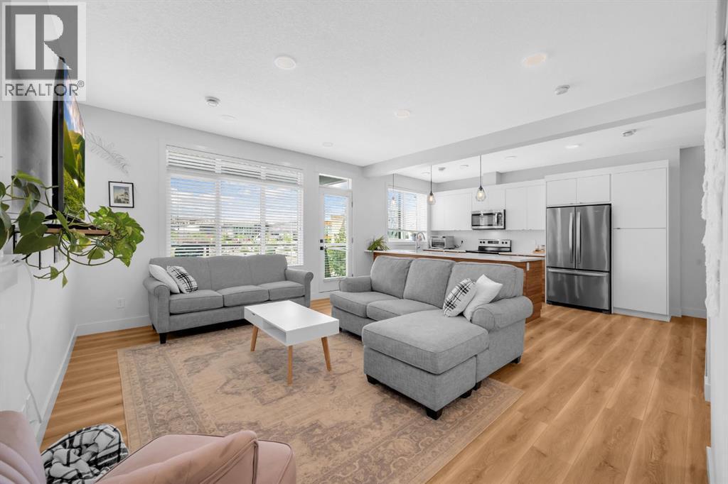 4397 Seton Drive Se, Calgary, AB - Indoor Photo Showing Living Room