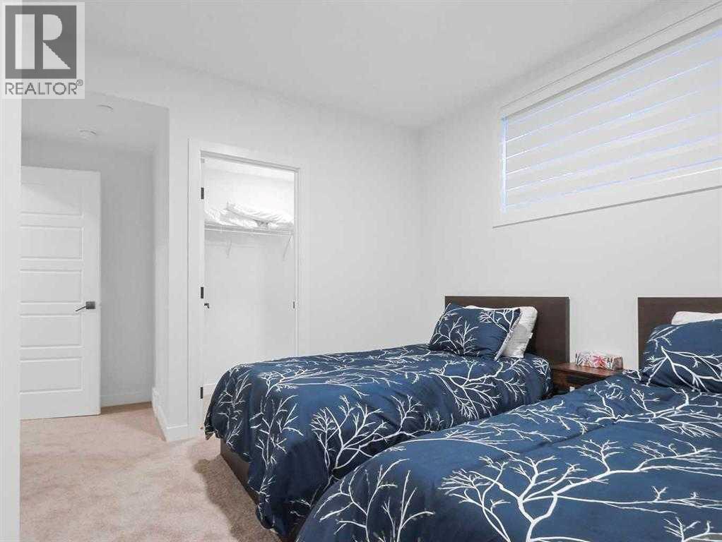 110 Sunstone Way, Balzac, AB - Indoor Photo Showing Bedroom