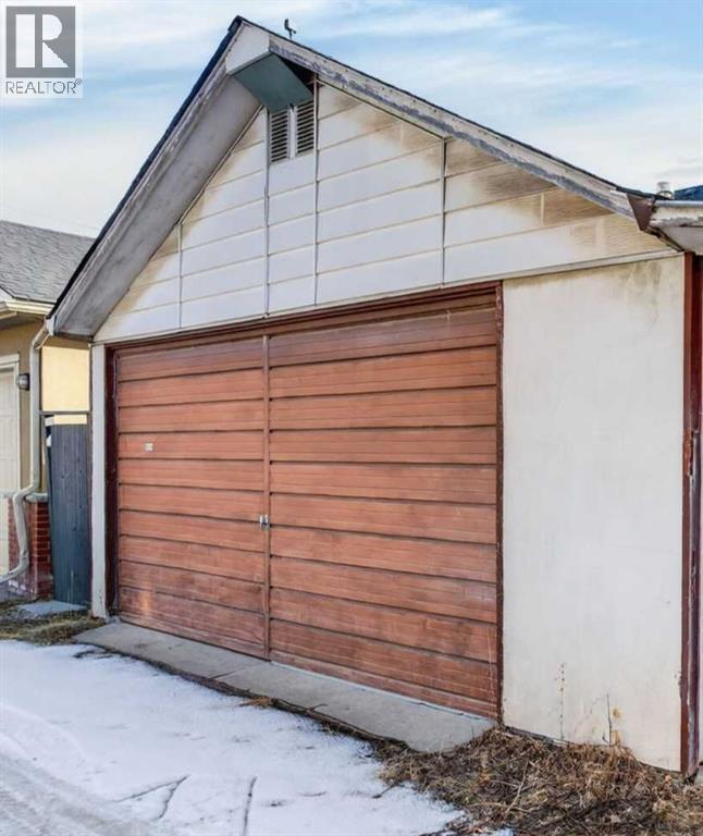 Double Car Garage (Looks great after a cleaning!) - 414 12 Avenue Nw, Calgary, AB - Outdoor With Exterior