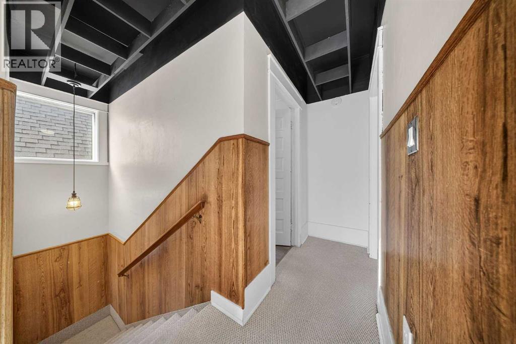 Hallway Upstairs - 414 12 Avenue Nw, Calgary, AB - Indoor Photo Showing Other Room