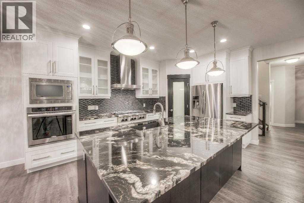 53 Sherwood Square Nw, Calgary, AB - Indoor Photo Showing Kitchen With Upgraded Kitchen