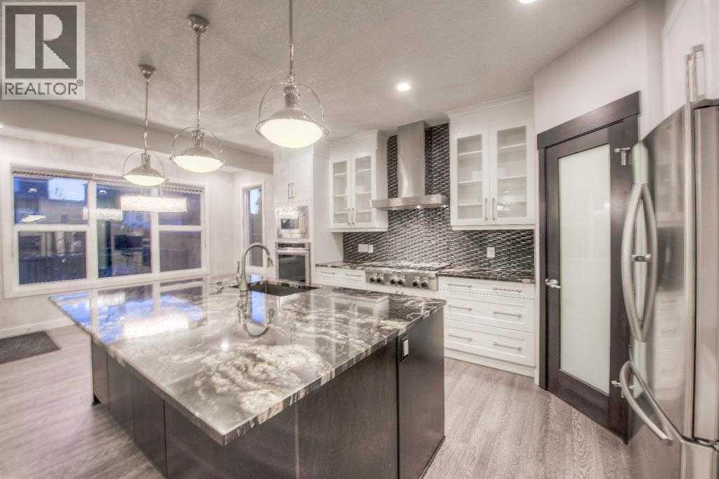 53 Sherwood Square Nw, Calgary, AB - Indoor Photo Showing Kitchen With Upgraded Kitchen