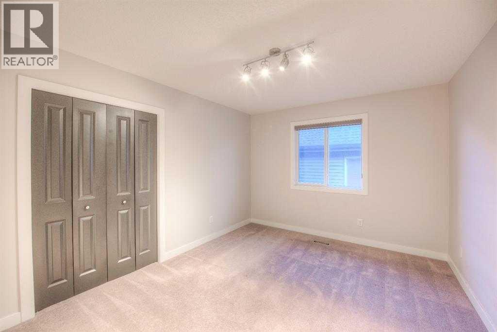 53 Sherwood Square Nw, Calgary, AB - Indoor Photo Showing Other Room