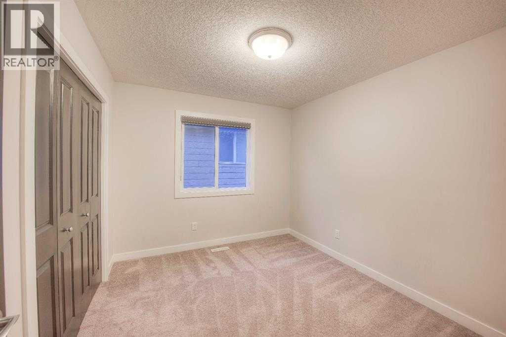53 Sherwood Square Nw, Calgary, AB - Indoor Photo Showing Other Room