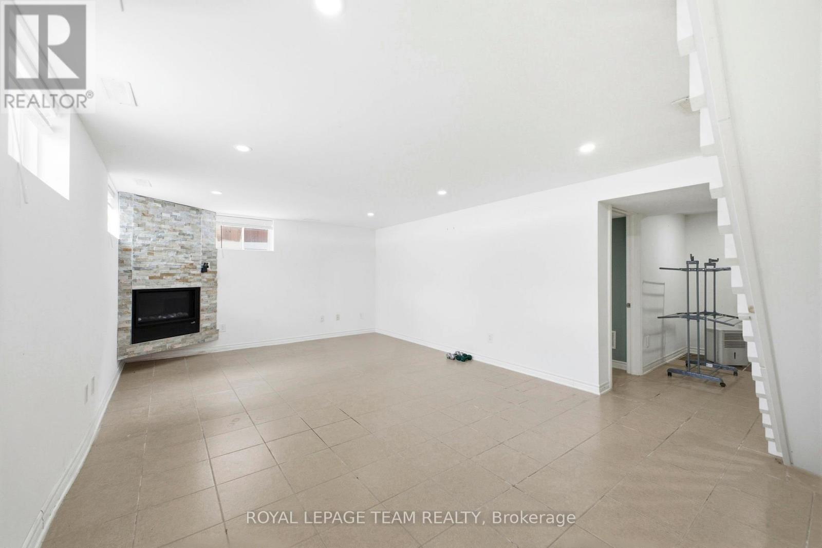 2171 Martha Avenue, Ottawa, ON - Indoor Photo Showing Other Room With Fireplace