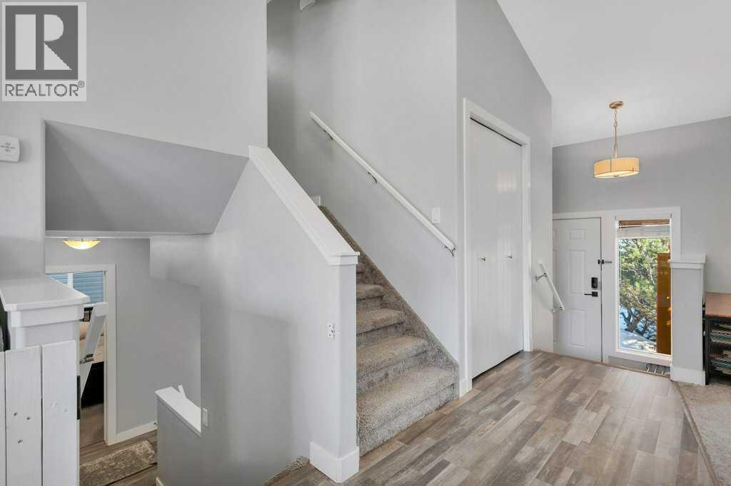 12 Rutherford Drive, Red Deer, AB - Indoor Photo Showing Other Room With Fireplace