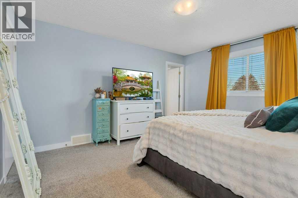 12 Rutherford Drive, Red Deer, AB - Indoor Photo Showing Bedroom