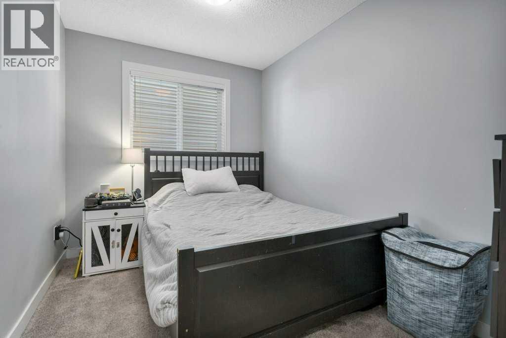 12 Rutherford Drive, Red Deer, AB - Indoor Photo Showing Bedroom