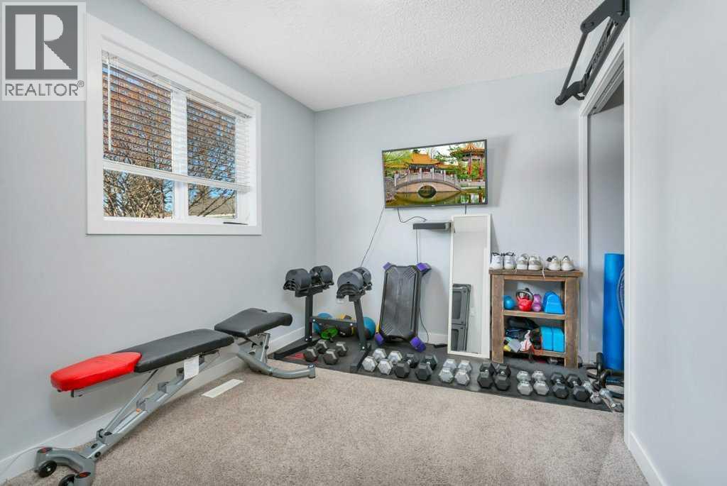 12 Rutherford Drive, Red Deer, AB - Indoor Photo Showing Gym Room