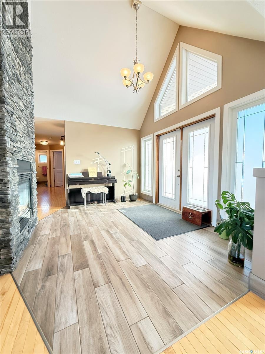 785 Washington Drive, Weyburn, SK - Indoor With Fireplace