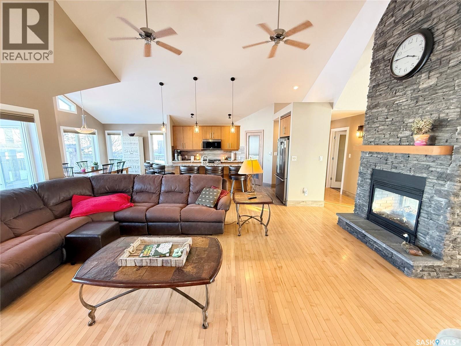 785 Washington Drive, Weyburn, SK - Indoor Photo Showing Living Room With Fireplace