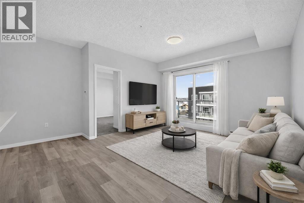 Virtual staging - 1410, 33 Carringham Gate Nw, Calgary, AB - Indoor Photo Showing Living Room