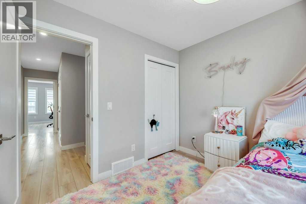 121 Dawson Circle, Chestermere, AB - Indoor Photo Showing Bedroom