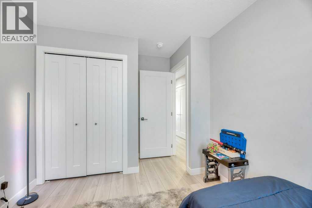 121 Dawson Circle, Chestermere, AB - Indoor Photo Showing Bedroom