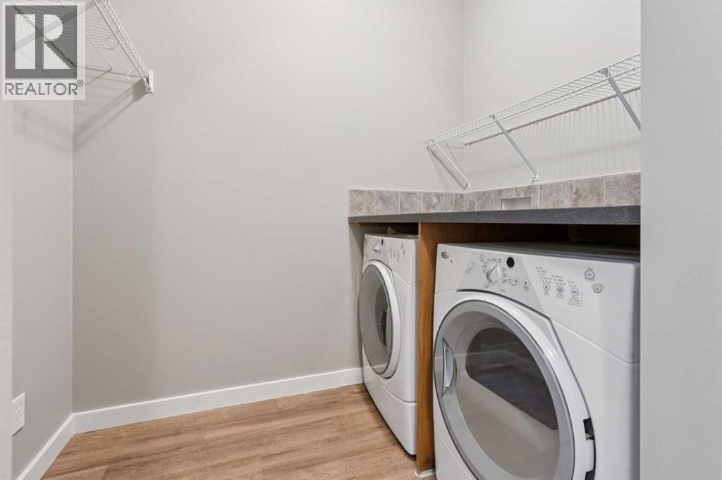 327 Panamount Point Nw, Calgary, AB - Indoor Photo Showing Laundry Room