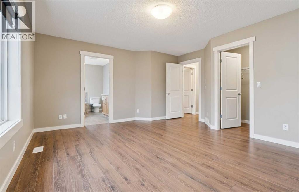327 Panamount Point Nw, Calgary, AB - Indoor Photo Showing Other Room