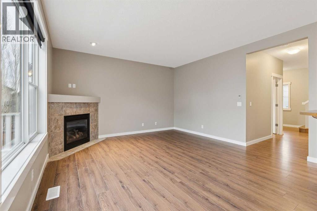 327 Panamount Point Nw, Calgary, AB - Indoor With Fireplace