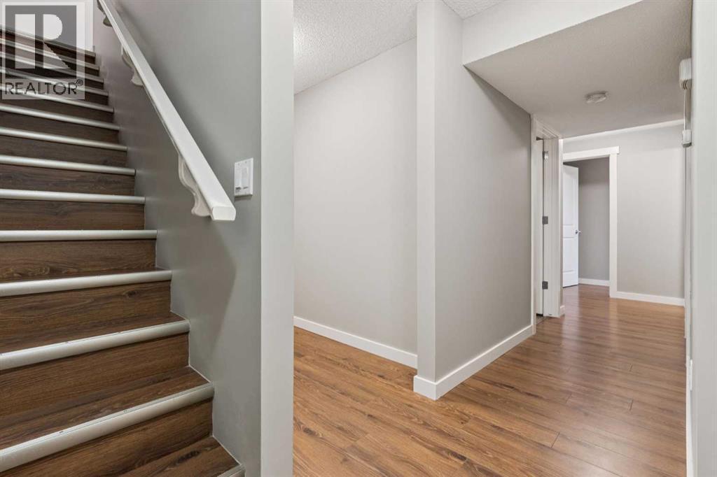 327 Panamount Point Nw, Calgary, AB - Indoor Photo Showing Other Room