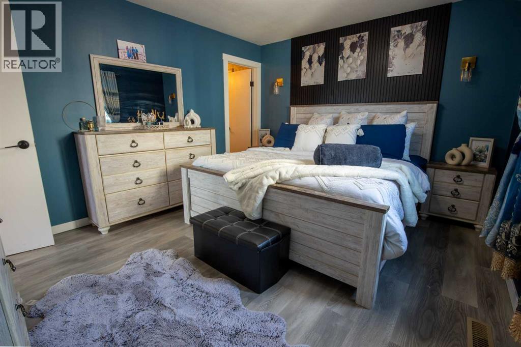 5018 42 Avenue, Taber, AB - Indoor Photo Showing Bedroom