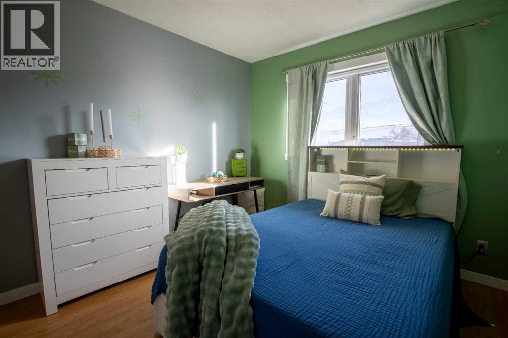 5018 42 Avenue, Taber, AB - Indoor Photo Showing Bedroom